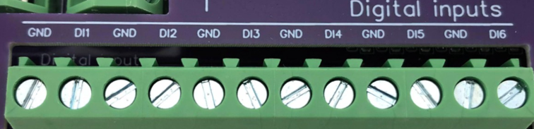 A close-up of a green device Description automatically generated